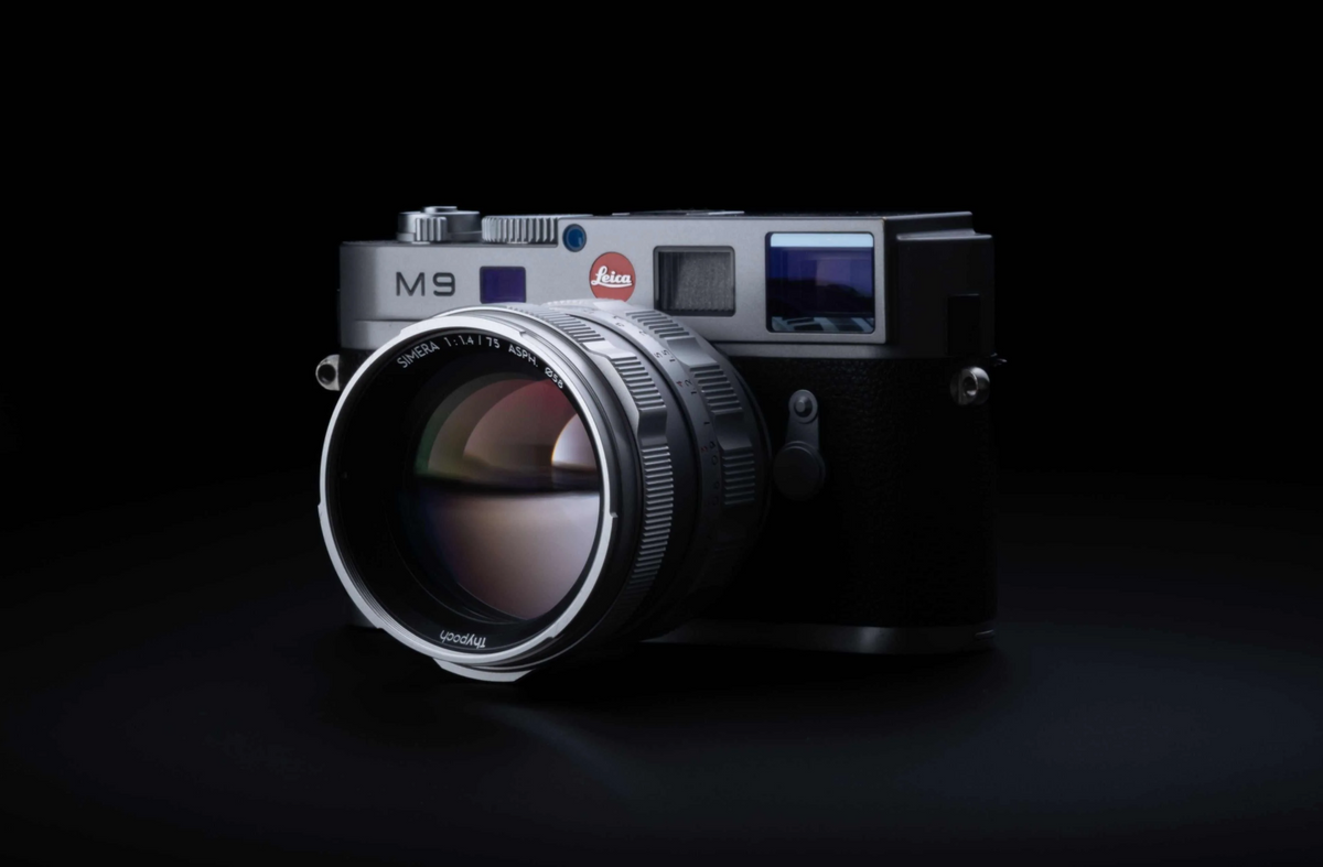 Thypoch Simera 75mm f/1.4 silver lens on a silver Leica M9 camera