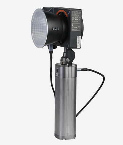 Sirui C150X with reflector on the H99 Pro battery handle, side view