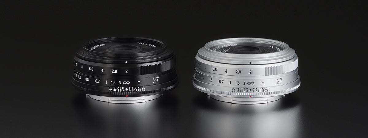 Voigtlander Ultron 27mm f/2 pancake lenses in black and silver side by side