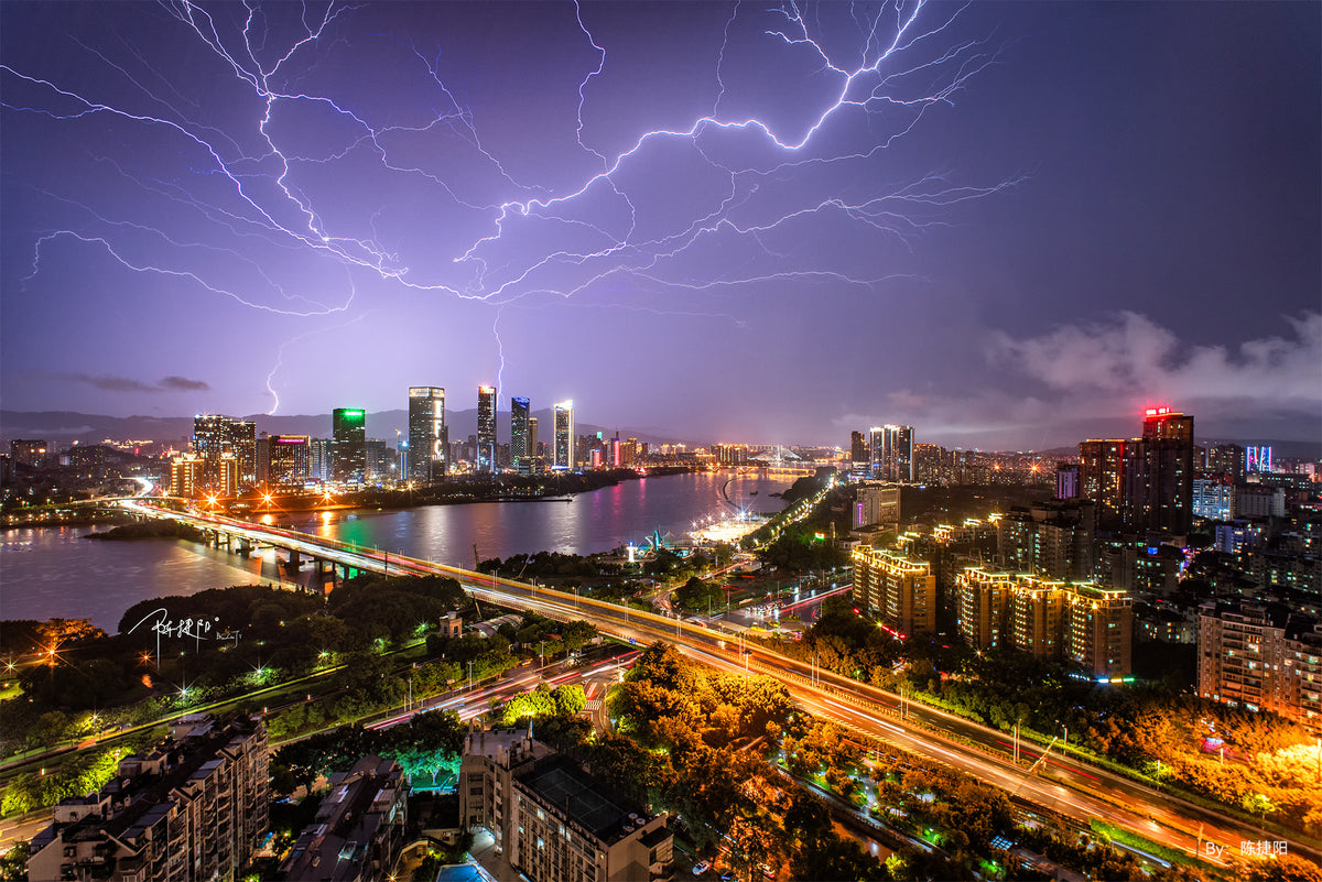 Lightning over a city skyline at night, sample from the TTArtisan 10mm f/2