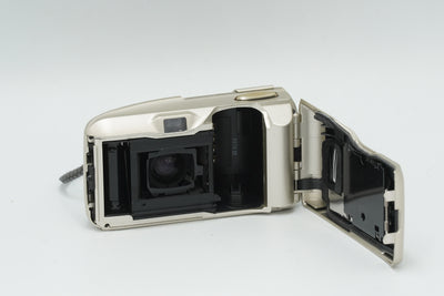 Olympus Mju-II film camera with the back open, showing the film chamber