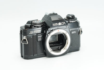 Minolta X-700 black 35mm SLR film camera body, front view