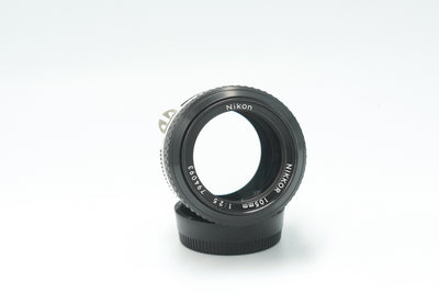 Nikon Nikkor 105mm f/2.5 lens, front view of the name ring