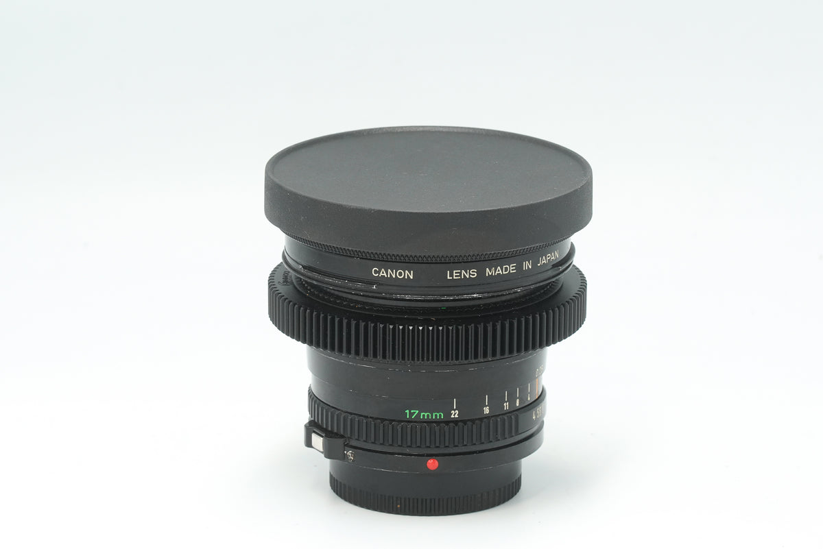 Canon nFD 17mm f/4 cine mod with slip-on front cap and focus gear
