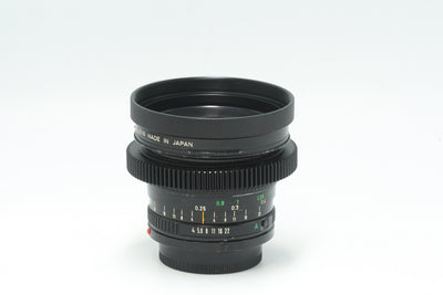 Canon nFD 17mm f/4 cine-modded with focus gear and metal hood