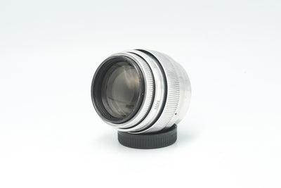 Jupiter-9 85mm f/2 silver, front three-quarter view