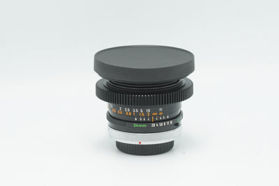 Canon FD 24mm f/2.8 S.S.C. cine-modded with focus gear and slip-on front cap