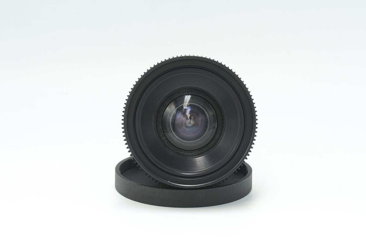 Canon nFD 17mm f/4 cine mod, front view of the wide-angle element with focus gear