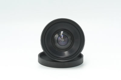 Canon nFD 17mm f/4 cine mod, front view of the wide-angle element with focus gear