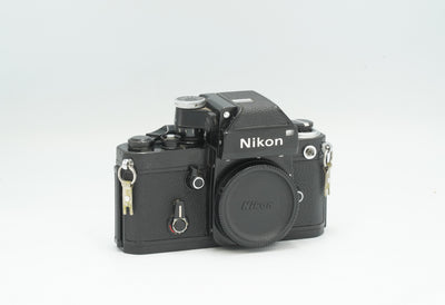 Nikon F2 35mm SLR film camera in black with DP-1 Photomic finder and body cap