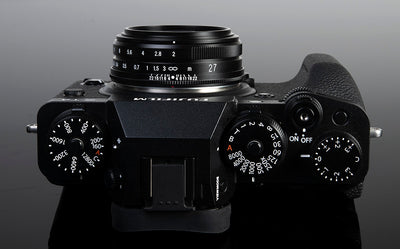 Voigtlander Ultron 27mm f/2 on a black Fujifilm X-T4, top view