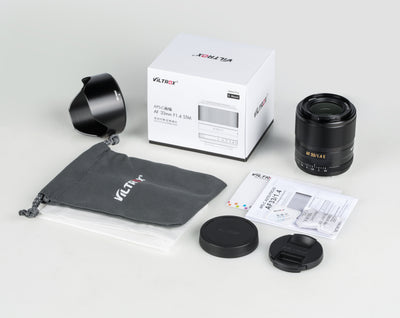 Viltrox AF 33mm f/1.4 XF box contents: lens, petal hood, pouch, caps and manual