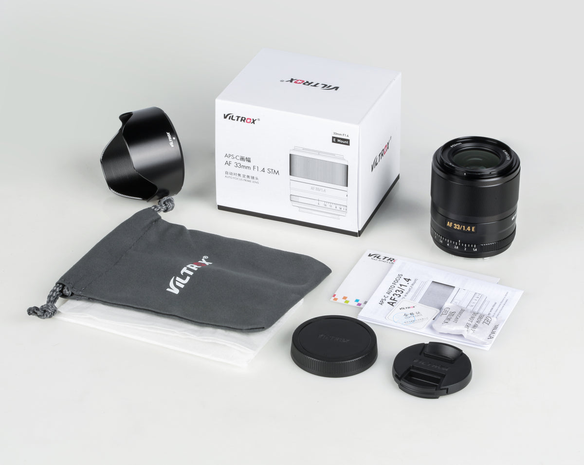 Viltrox AF 33mm f/1.4 XF box contents: lens, petal hood, pouch, caps and manual