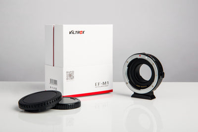 Viltrox EF-M1 adapter with box and front and rear caps