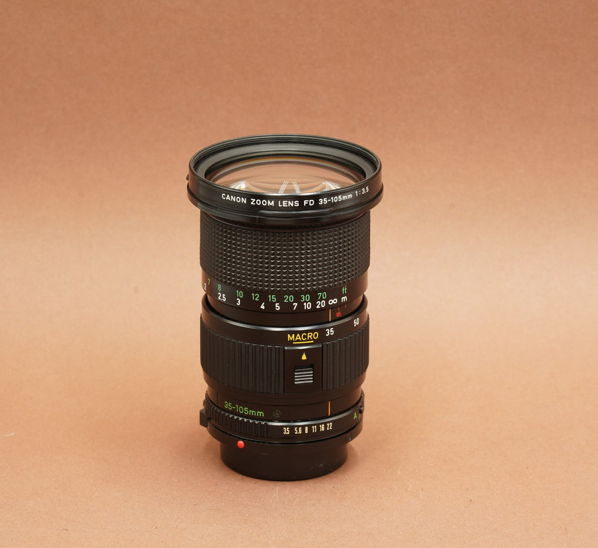 Canon FD 35-105mm f/3.5 Macro zoom, side view with focus scale and macro button