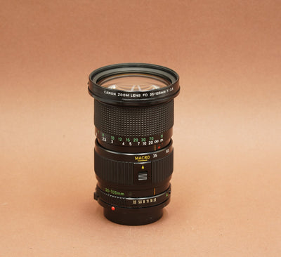 Canon FD 35-105mm f/3.5 Macro zoom, side view with focus scale and macro button