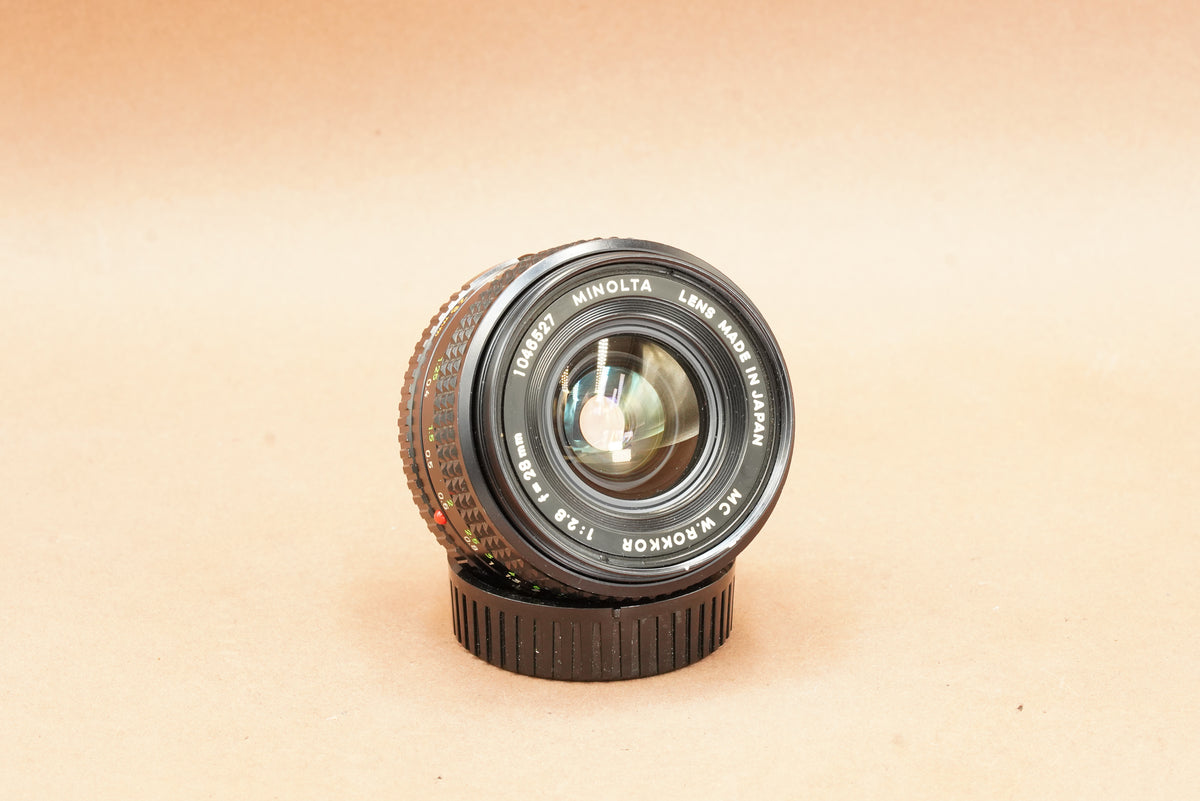 Minolta MC W.Rokkor 28mm f/2.8 lens, front view of the lens name ring