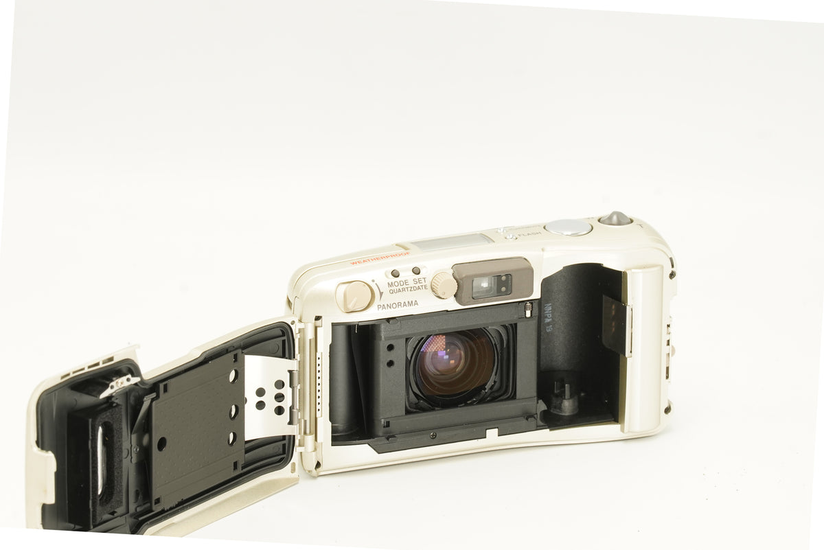 Olympus Mju Zoom 105 with the back open, showing the film chamber