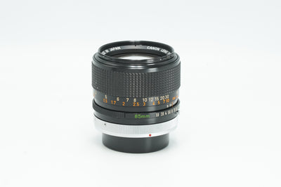 Canon FD 85mm f/1.8 S.S.C., front view with scales