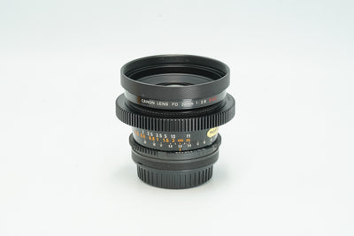 Canon FD 20mm f/2.8 cine-modded lens with gears, front view