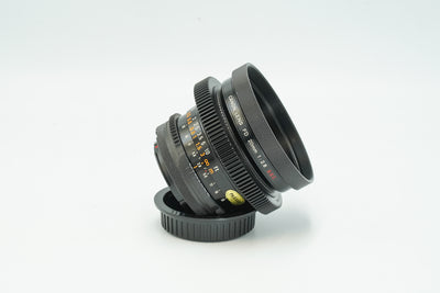 Canon FD 20mm f/2.8 cine-modded lens, side view with focus and iris gears