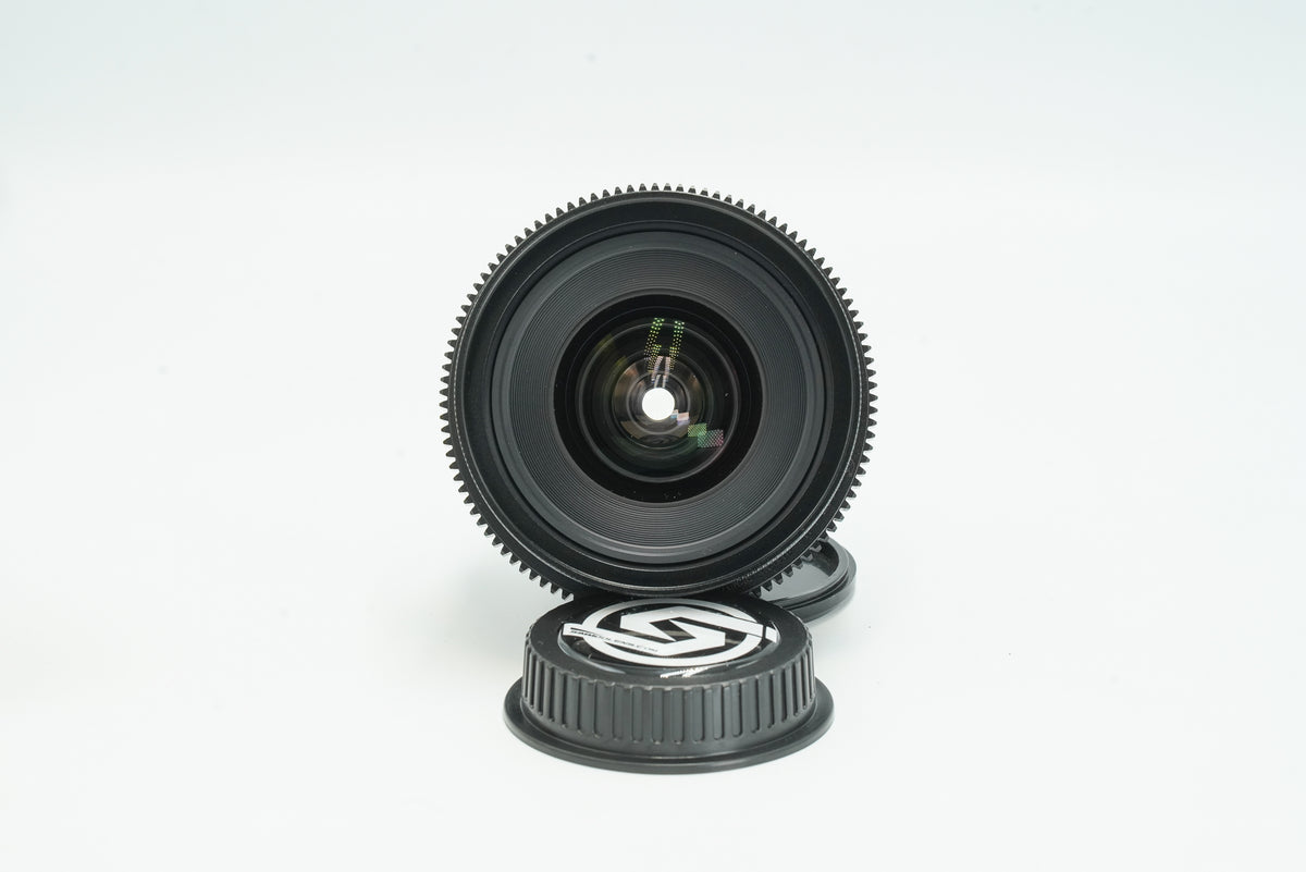 Canon FD 20mm cine-modded lens, front element with focus gear and rear cap