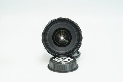 Canon FD 20mm cine-modded lens, front element with focus gear and rear cap