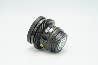 Canon FD 20mm cine-modded lens, angled view with rear cap fitted