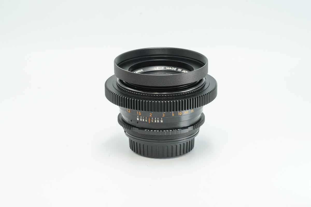 Canon FD 55mm f/1.2 S.S.C. cine mod with hood and focus gear