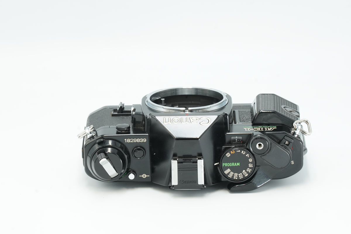 Canon AE-1 Program black, top view with Program dial and film advance lever