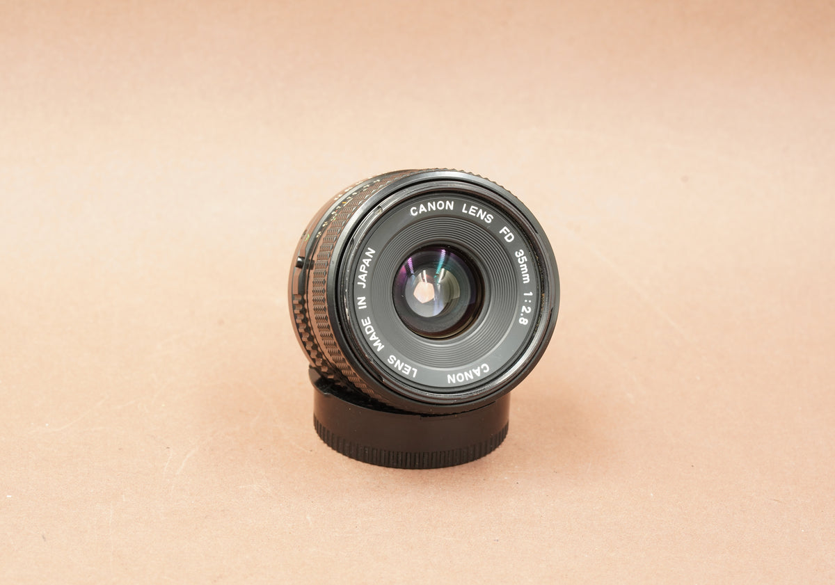 Canon FD 28mm f/2.8 lens, one of the lens options for the AE-1