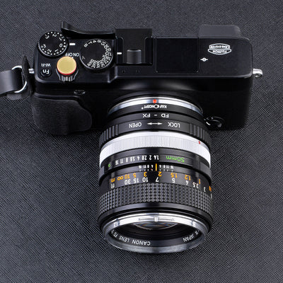 K&F Concept FD-FX adapter with a Canon FD 50mm lens on a Fujifilm X camera, top view