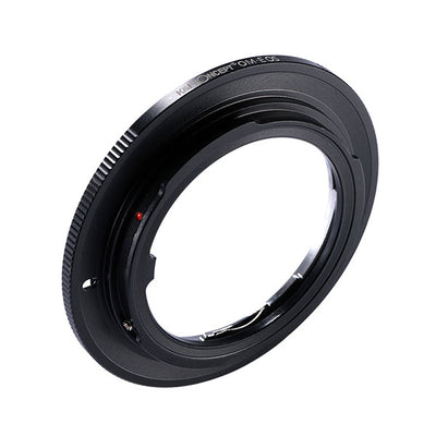 K&F Concept OM to EOS adapter, angled view with red alignment dot