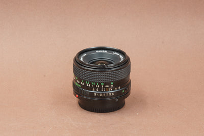Canon nFD 28mm f/2.8, side view with focus and aperture scales