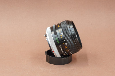 Canon FD 50mm f/1.4 S.S.C., side view on its rear cap