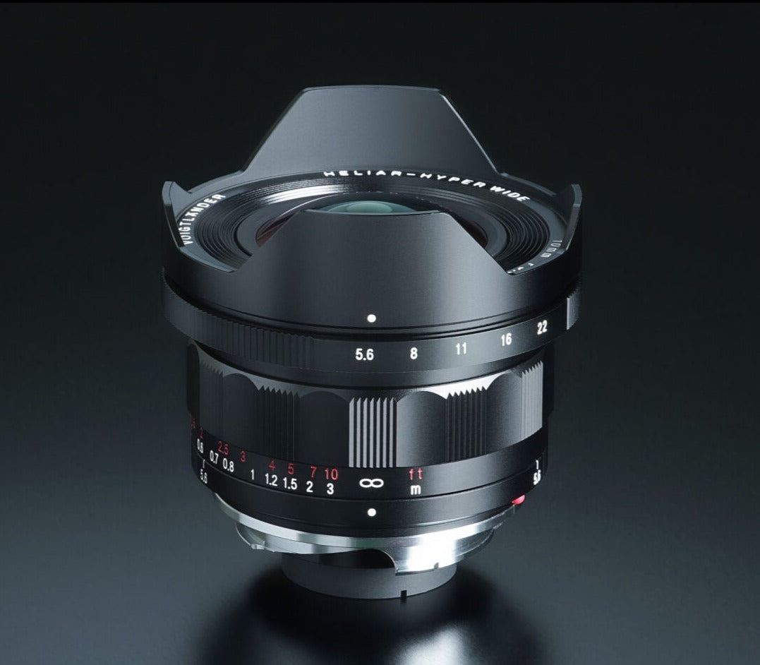 Voigtlander Heliar Hyper Wide 10mm f/5.6 on a dark background