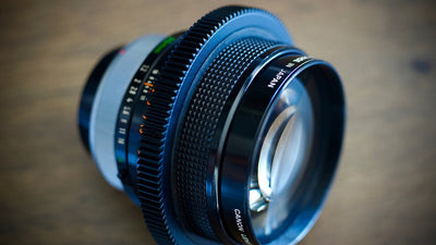 Canon FD lens fitted with a SIMMOD follow focus gear