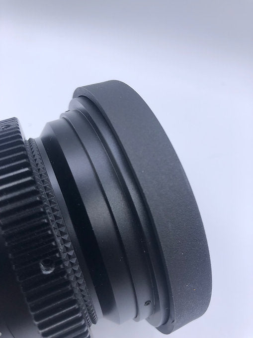 SIMMOD 80mm front cine cap, side close-up on a lens with focus gear