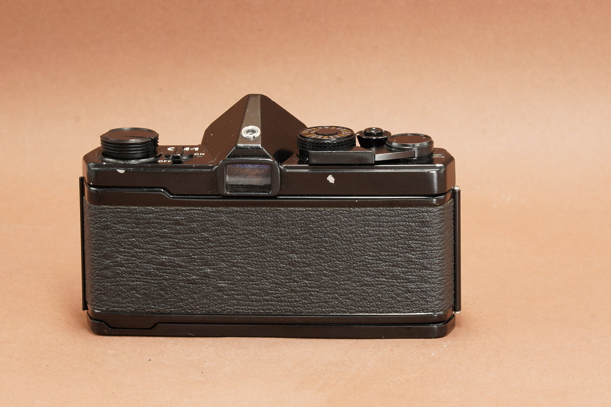 Olympus OM-1 black film camera, rear view